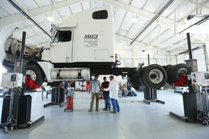 Arkansas State University - Newport Students listening to their instructor in the Diesel Program.